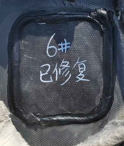 填埋場土工膜破損修復(fù)圖片